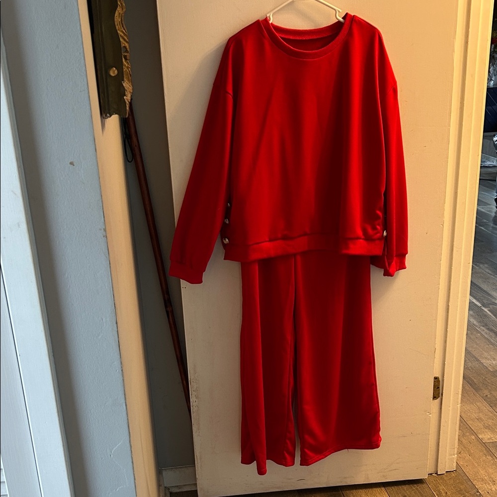 2 Piece NWOT Red exercising or Leisure Outfit . Notice Side Details